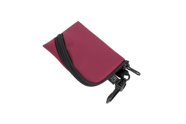 A Super Mini Ghost Whale Pouch in Raspberry.